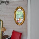 Miroir ovale doré