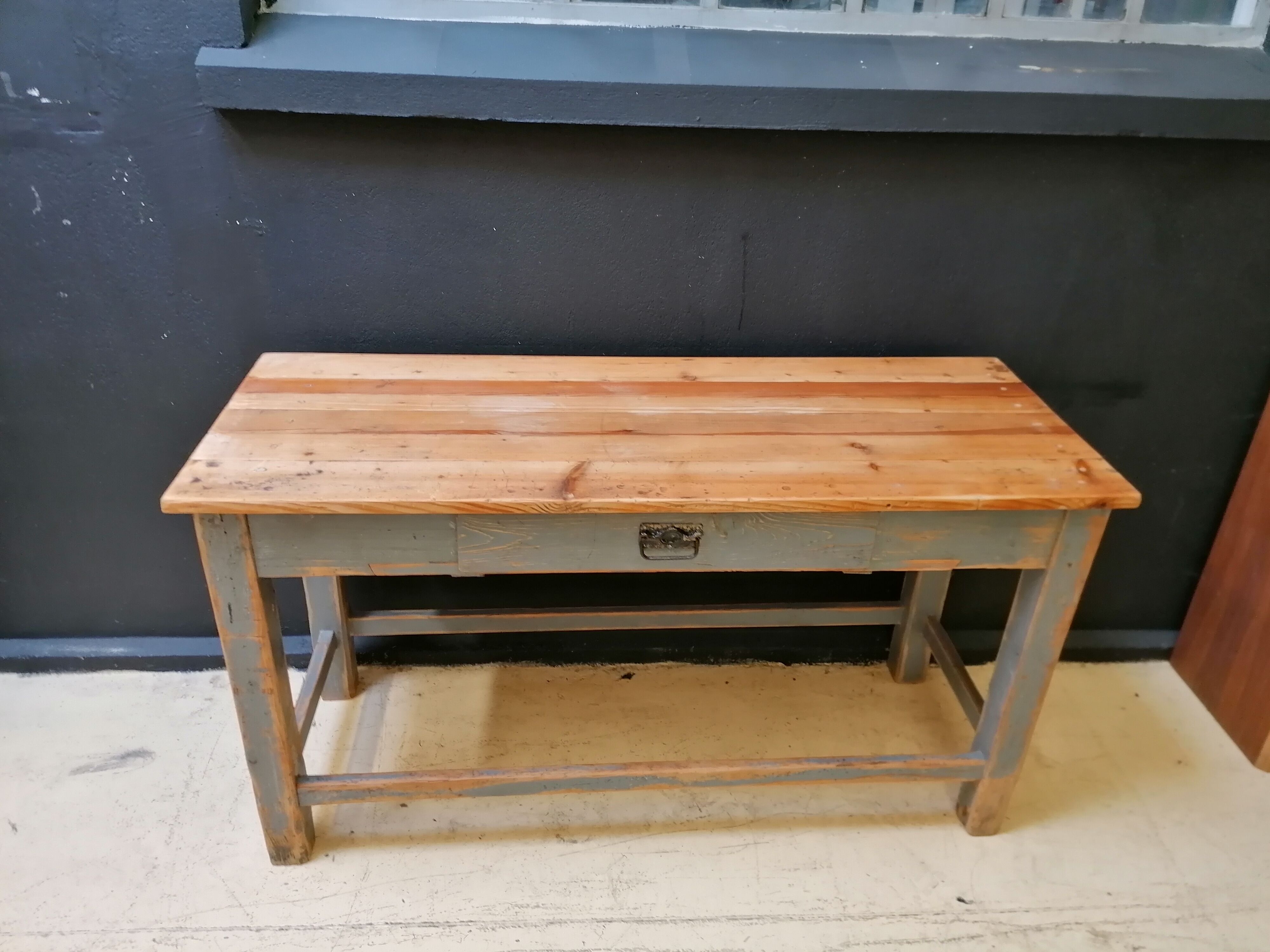 Patinated drapery table