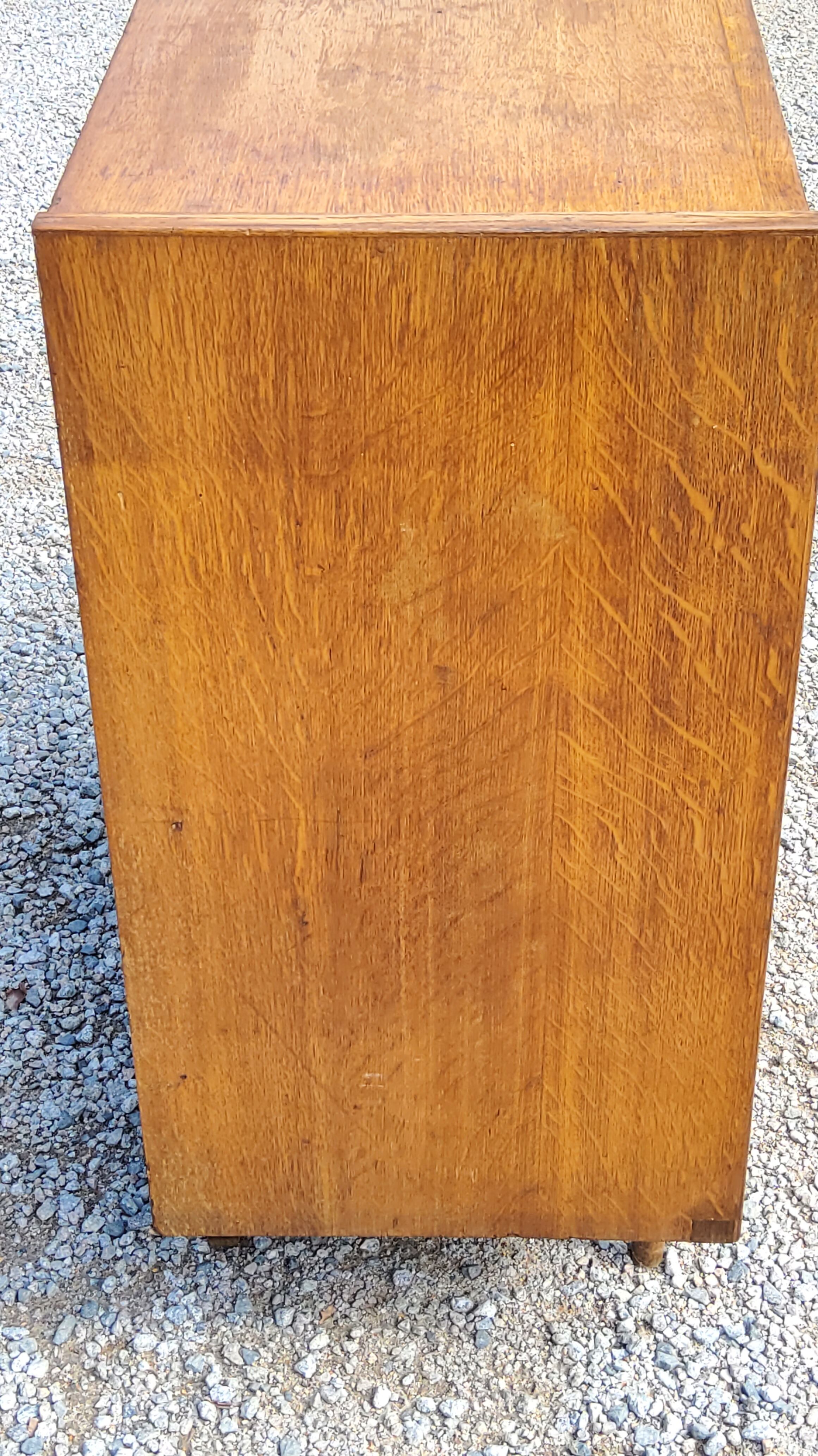 Chest of drawers of the 50s in golden blond oak 5 drawers conical feet