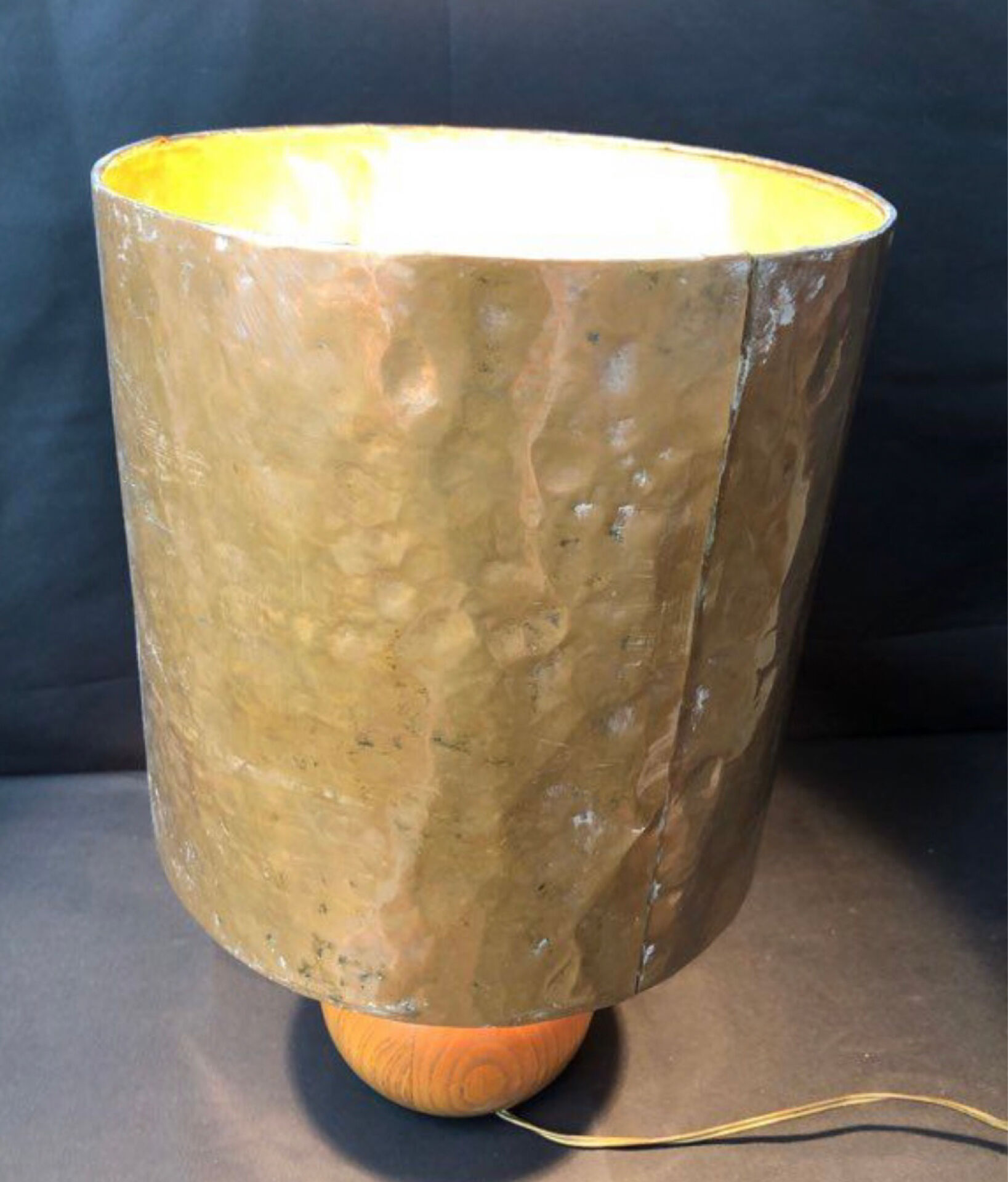 Vintage modernist lamp in wood and hammered copper.
