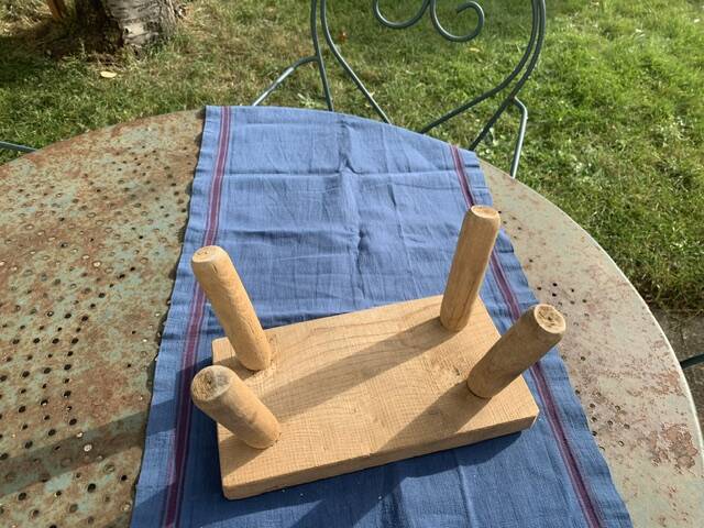 Small bench, footrest in artisanal raw wood