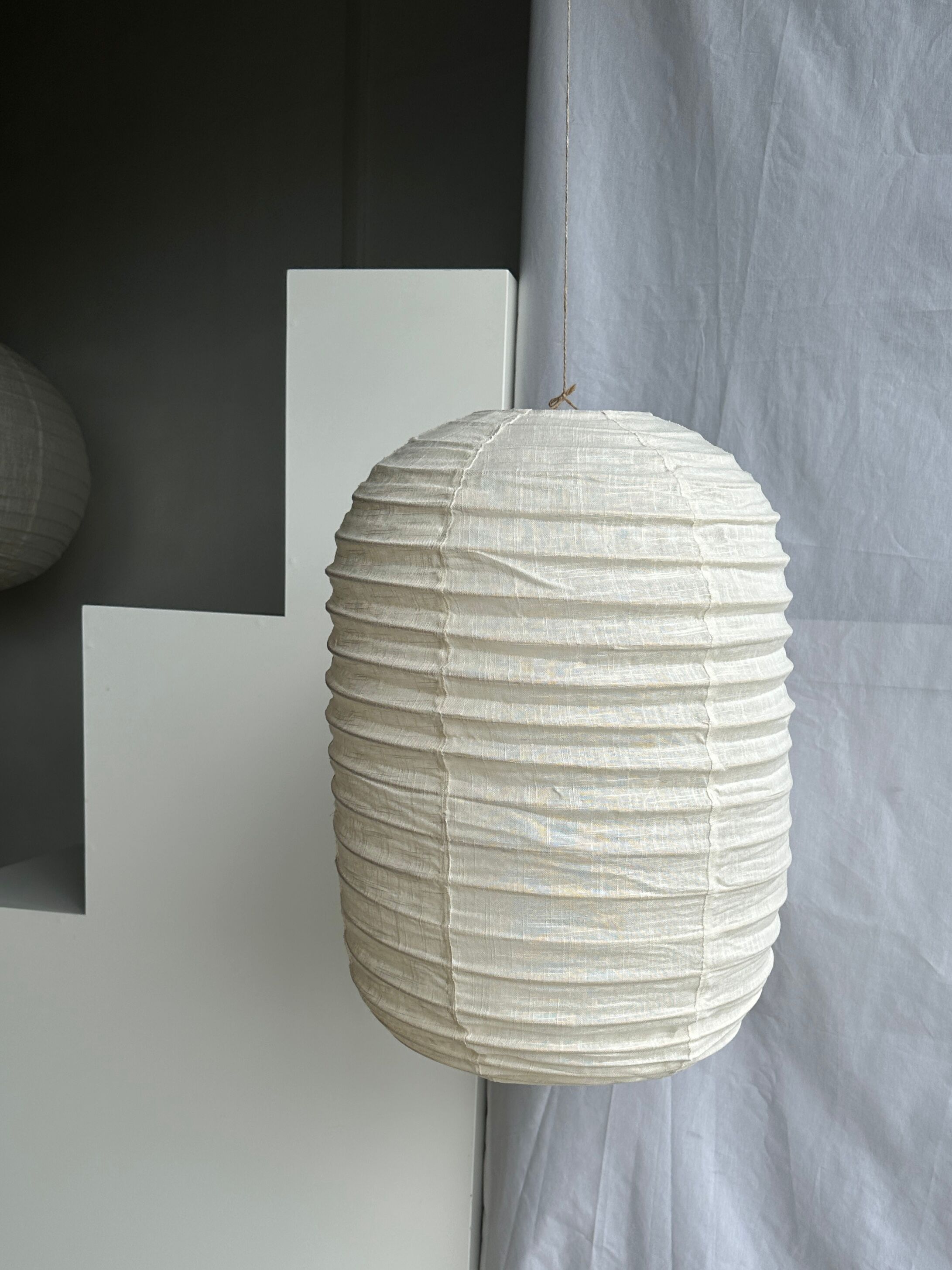 Suspension in rattan and natural japanese linen lantern shape h70 d50