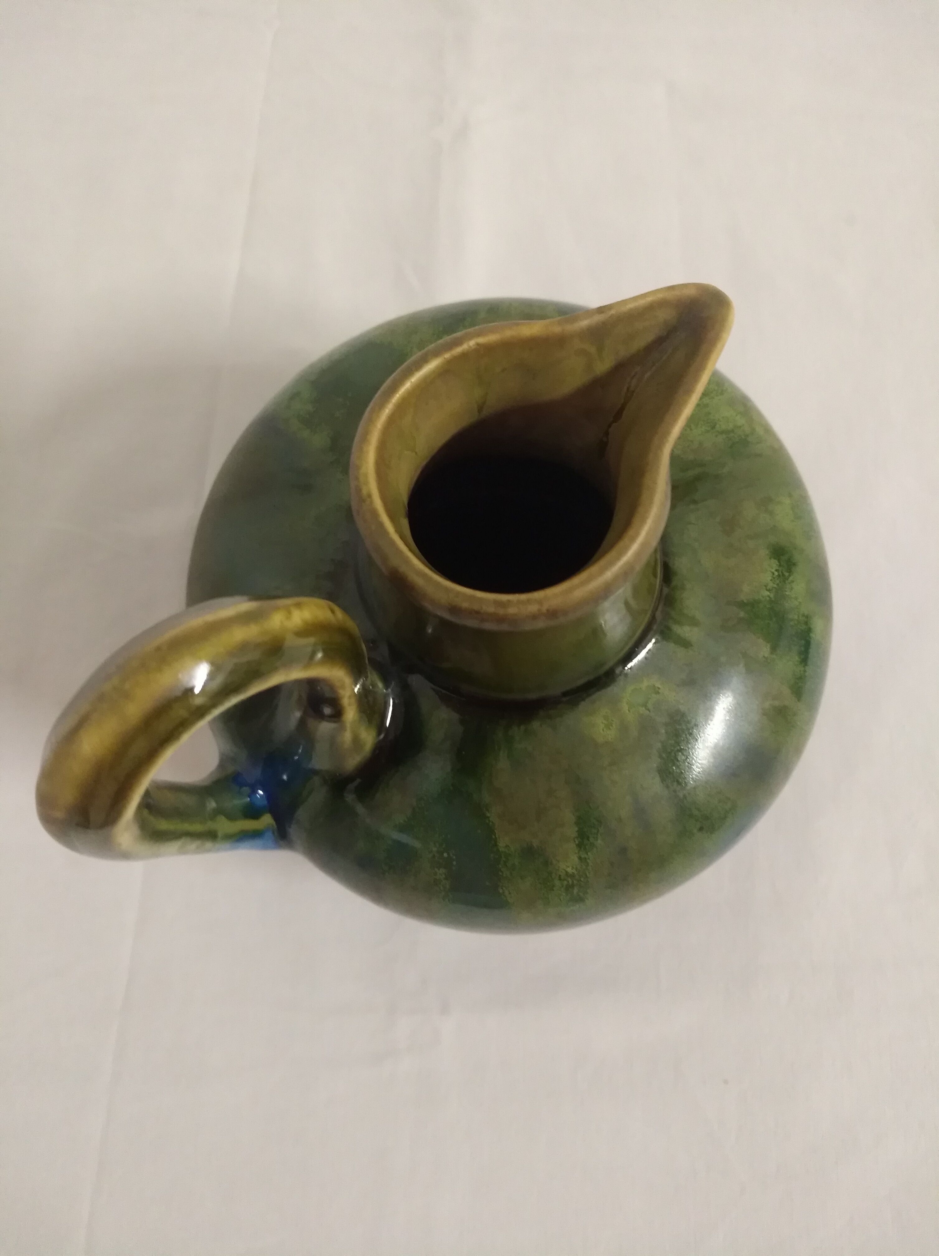 Flamed ceramic pitcher