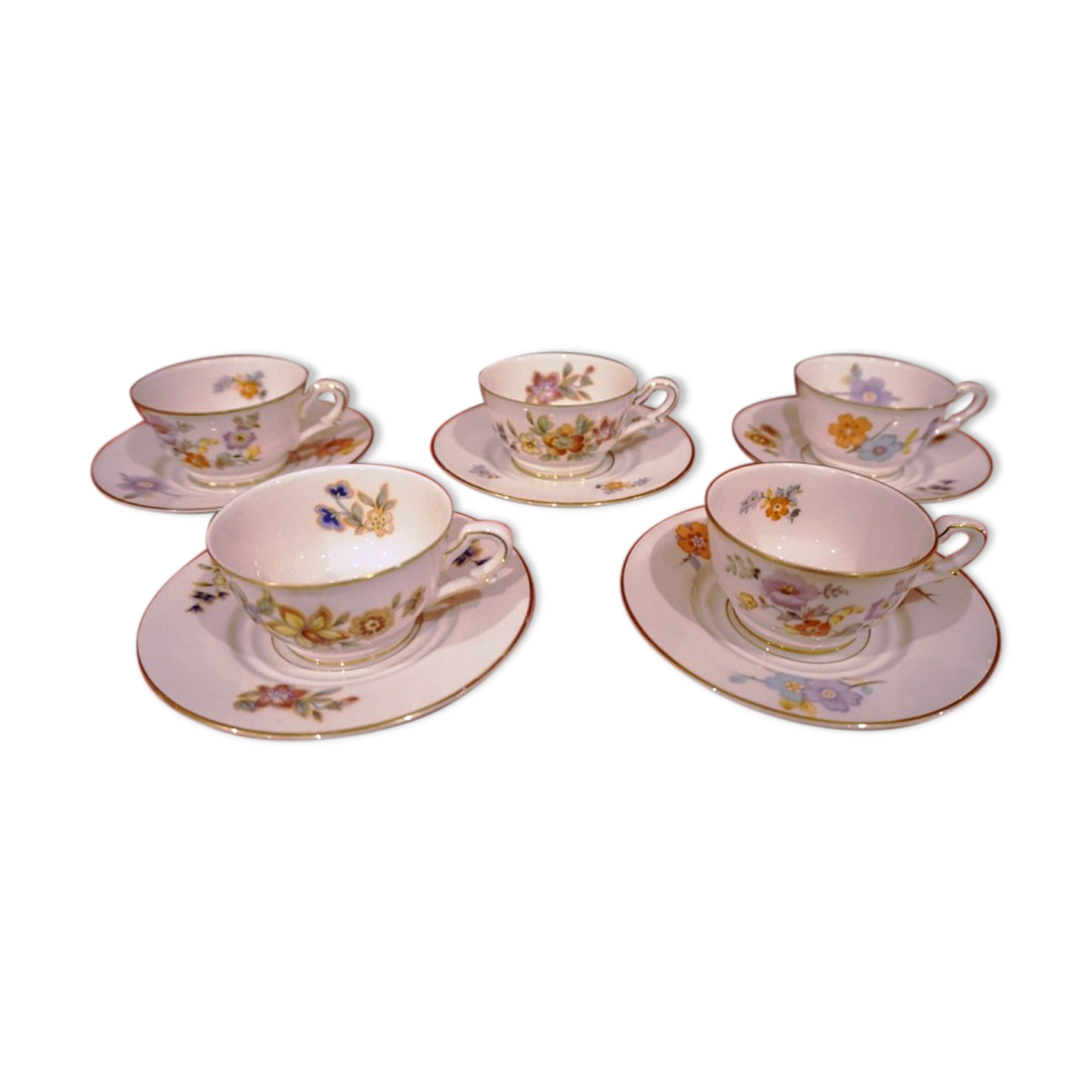 Old saucer cup in pink porcelain of Limoges