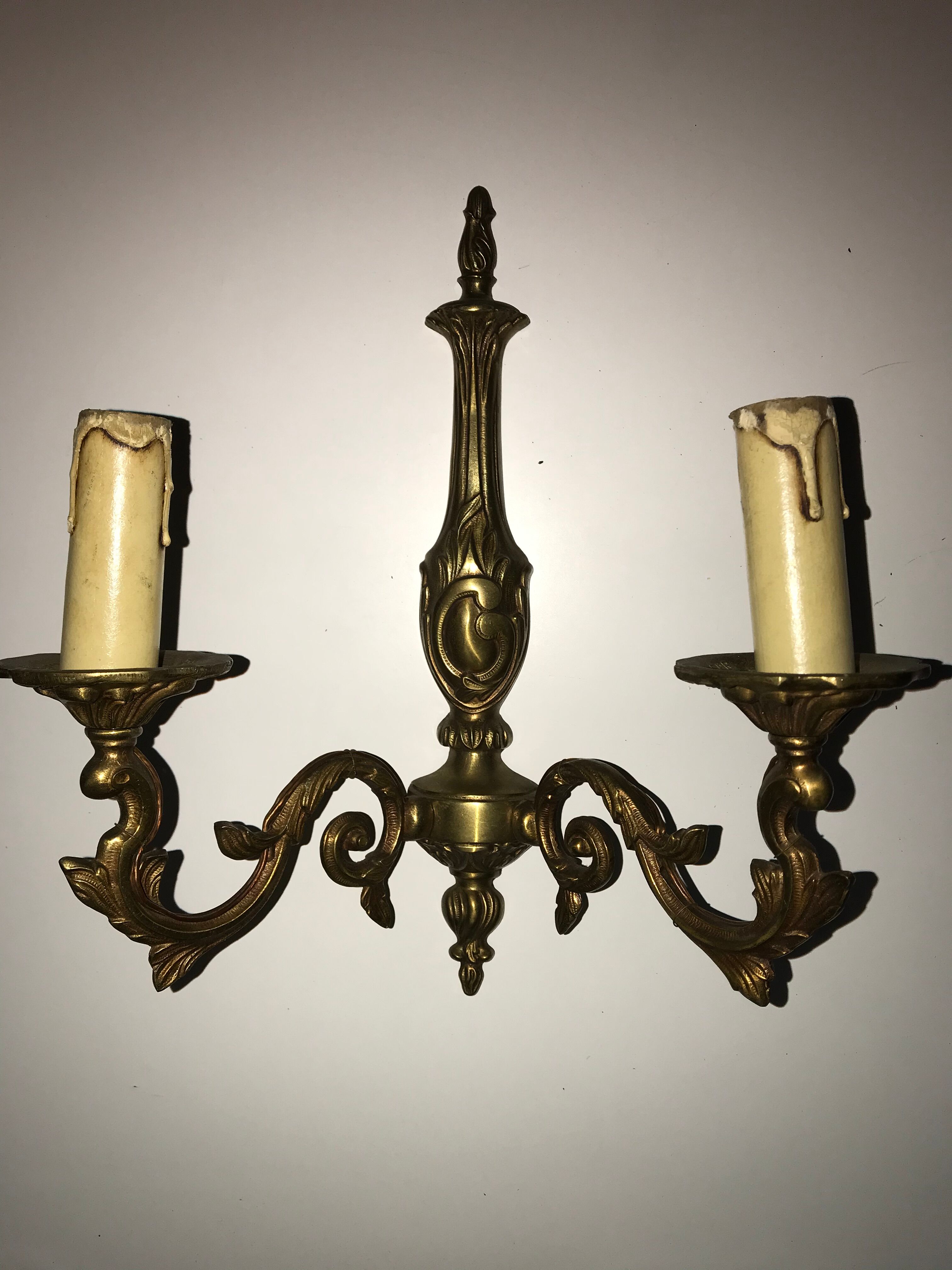 Pair of Louis XV style bronze wall sconces