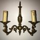 Pair of Louis XV style bronze wall sconces