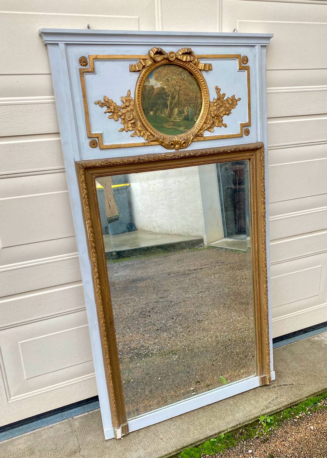 Trumeau mirror with oval decoration and wooden pediment 1920