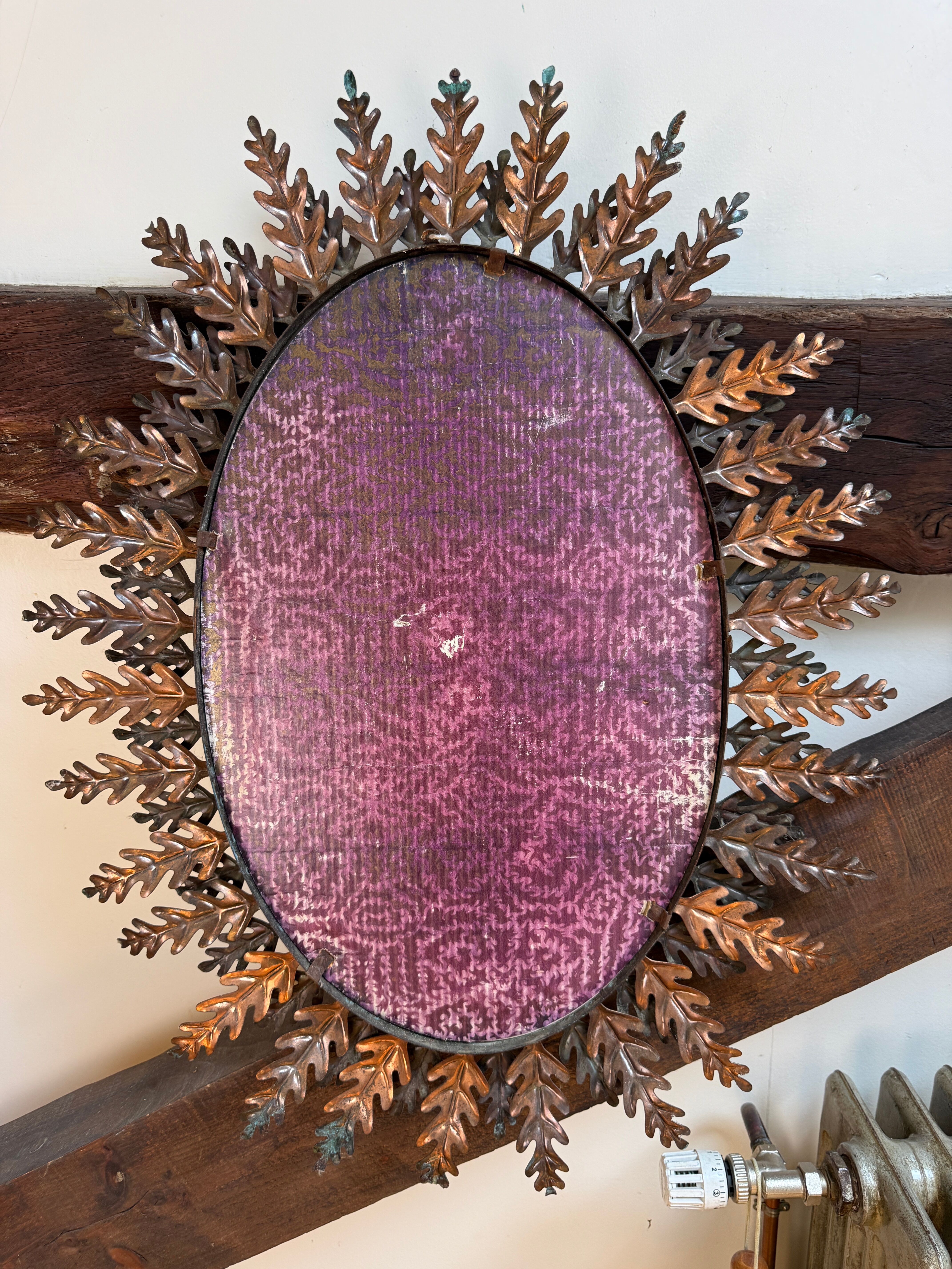 Oval sun mirror wrought iron from the 1950s Italy