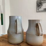 Pair vintage enamelled ceramic pitchers