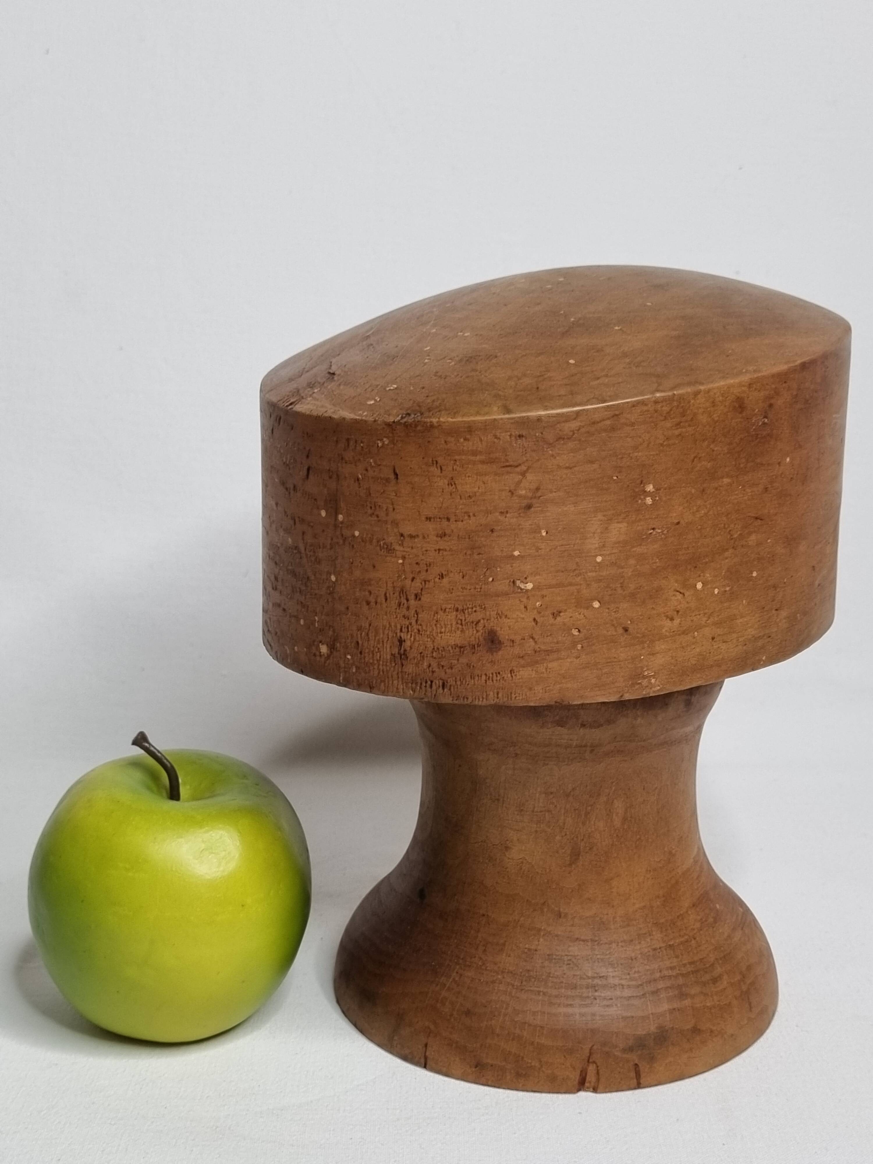 Old wooden hat shape on foot, 1900, 30