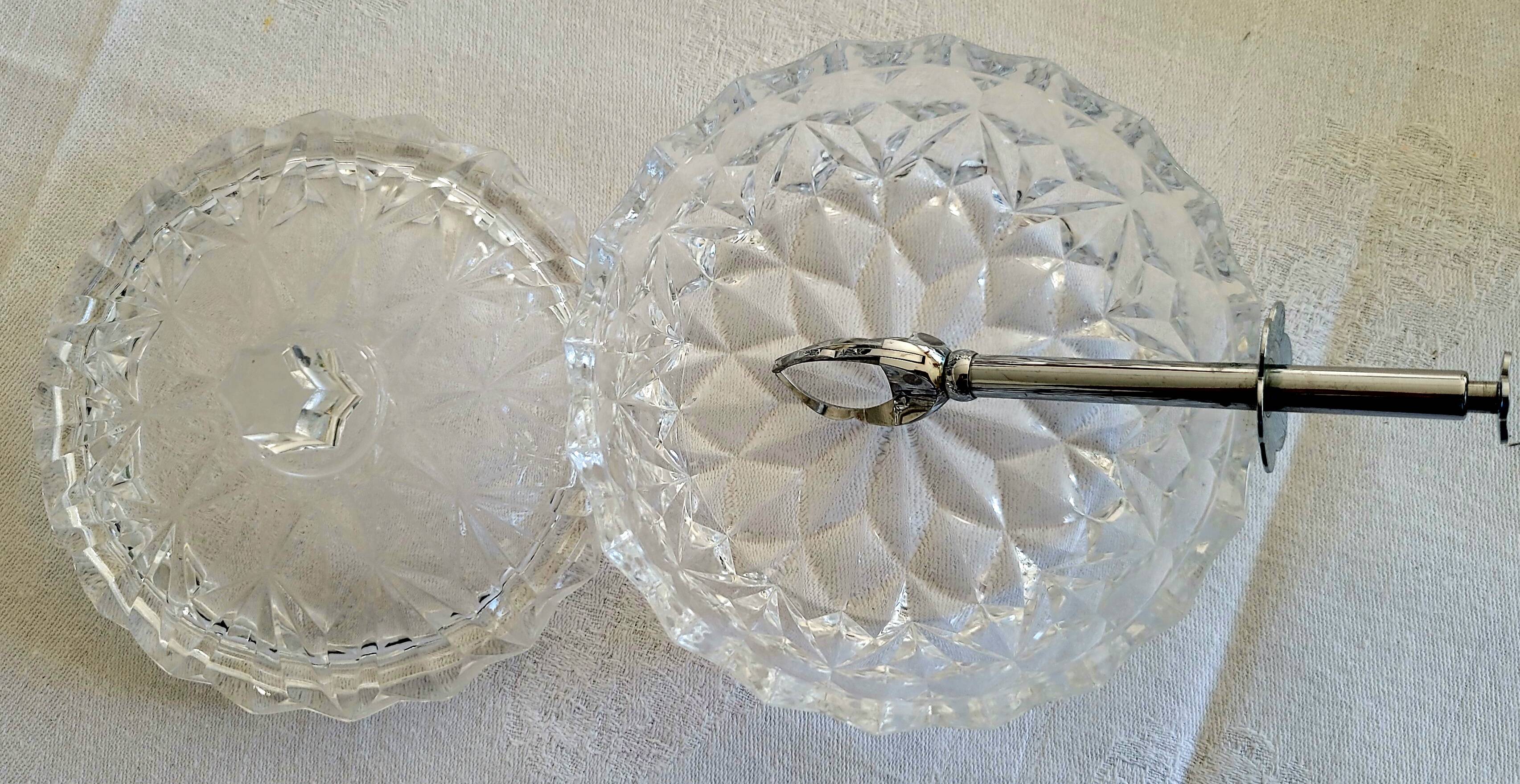 Glass sugar bowl with its tongs