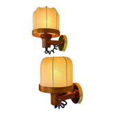 Pair of articulated "Cocoon" wall lights in resin and pine, Italy, circa 1970s