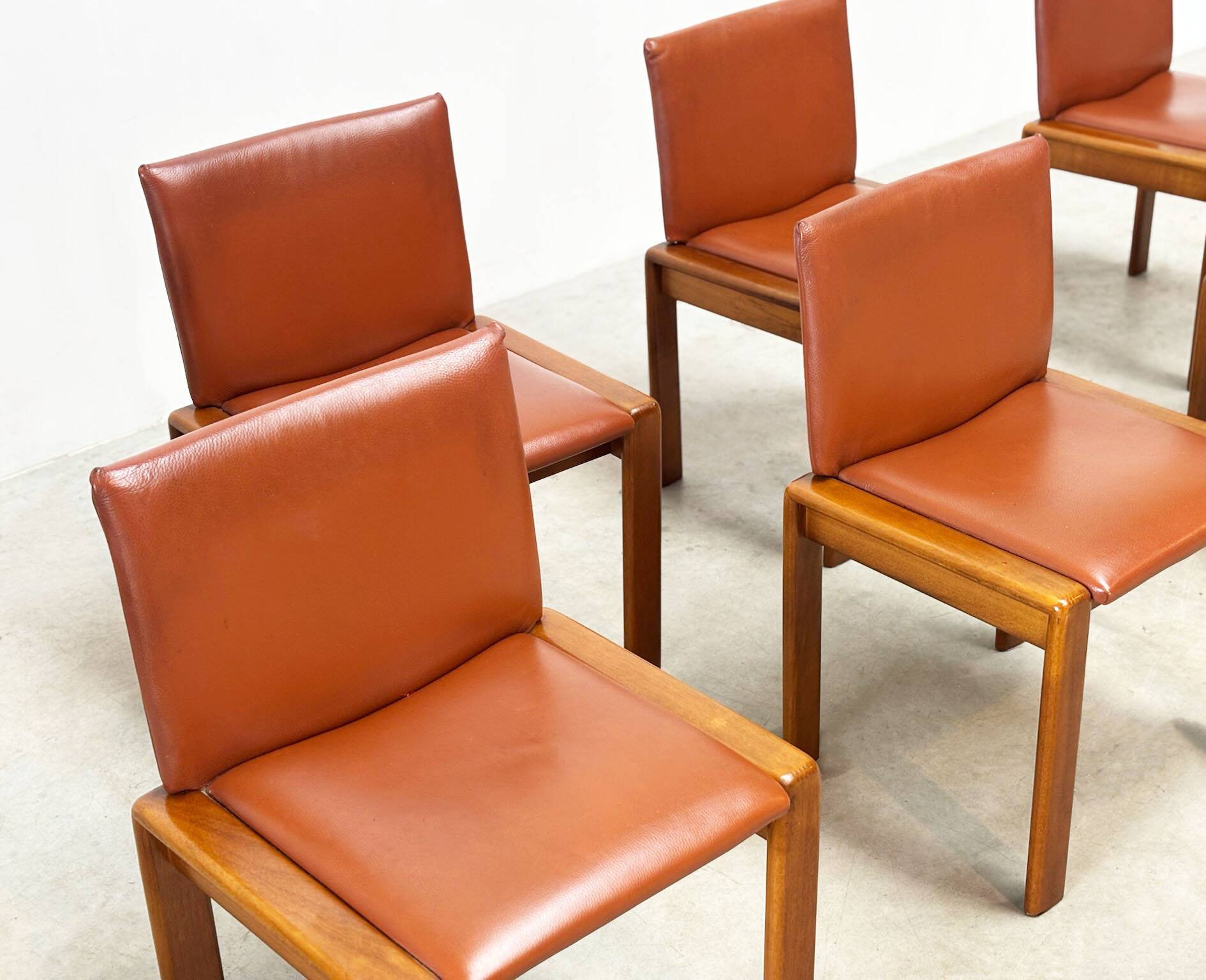 Set of six leather Italian dining chairs