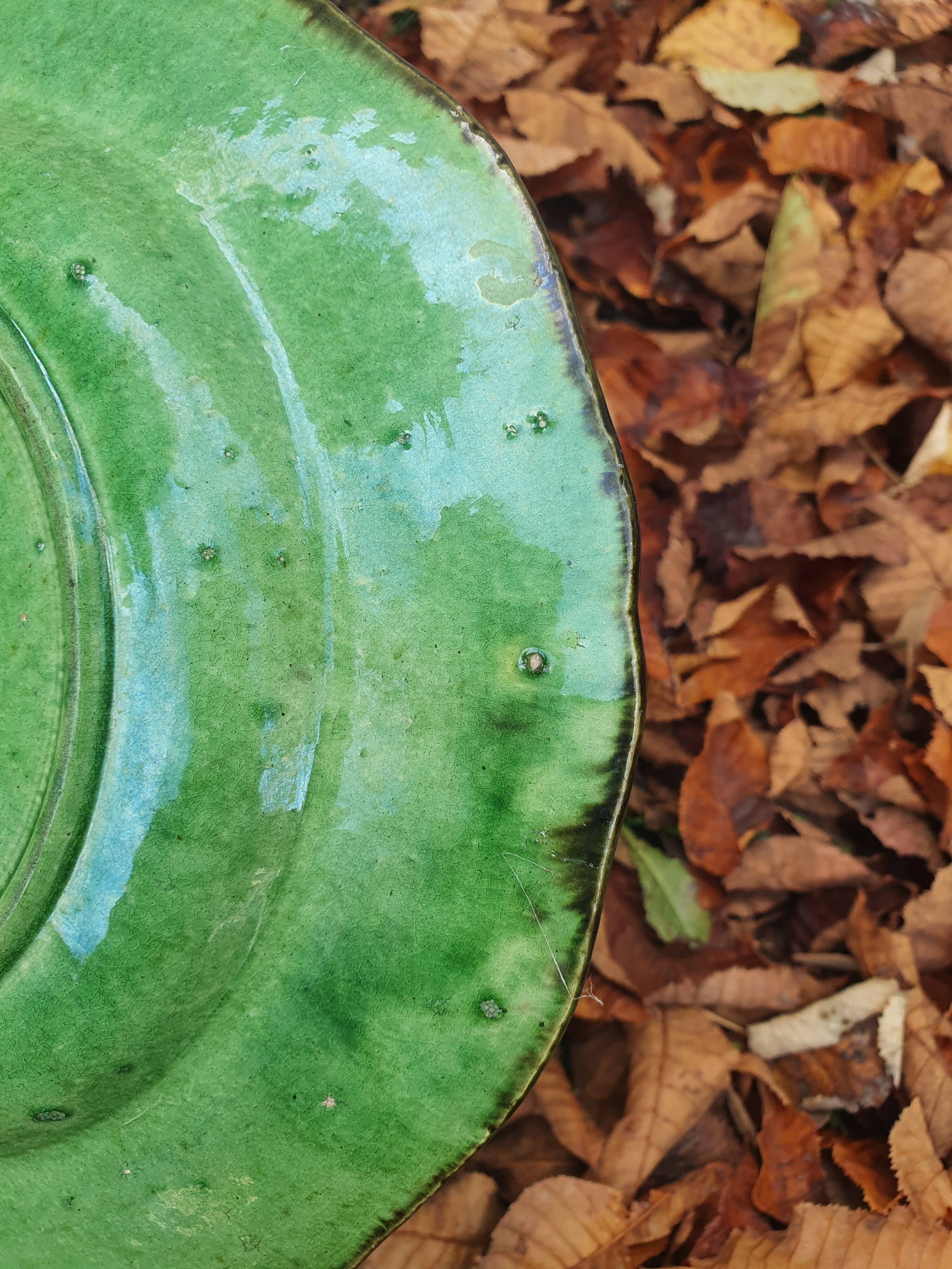 Hollow plate in green glazed clay Etienne Noël