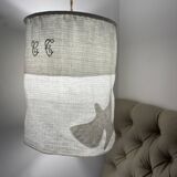 Old linen drapery with monogram and bird by Georges Braque