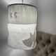 Suspension drap ancien en lin monogramme et oiseau de Georges Braque