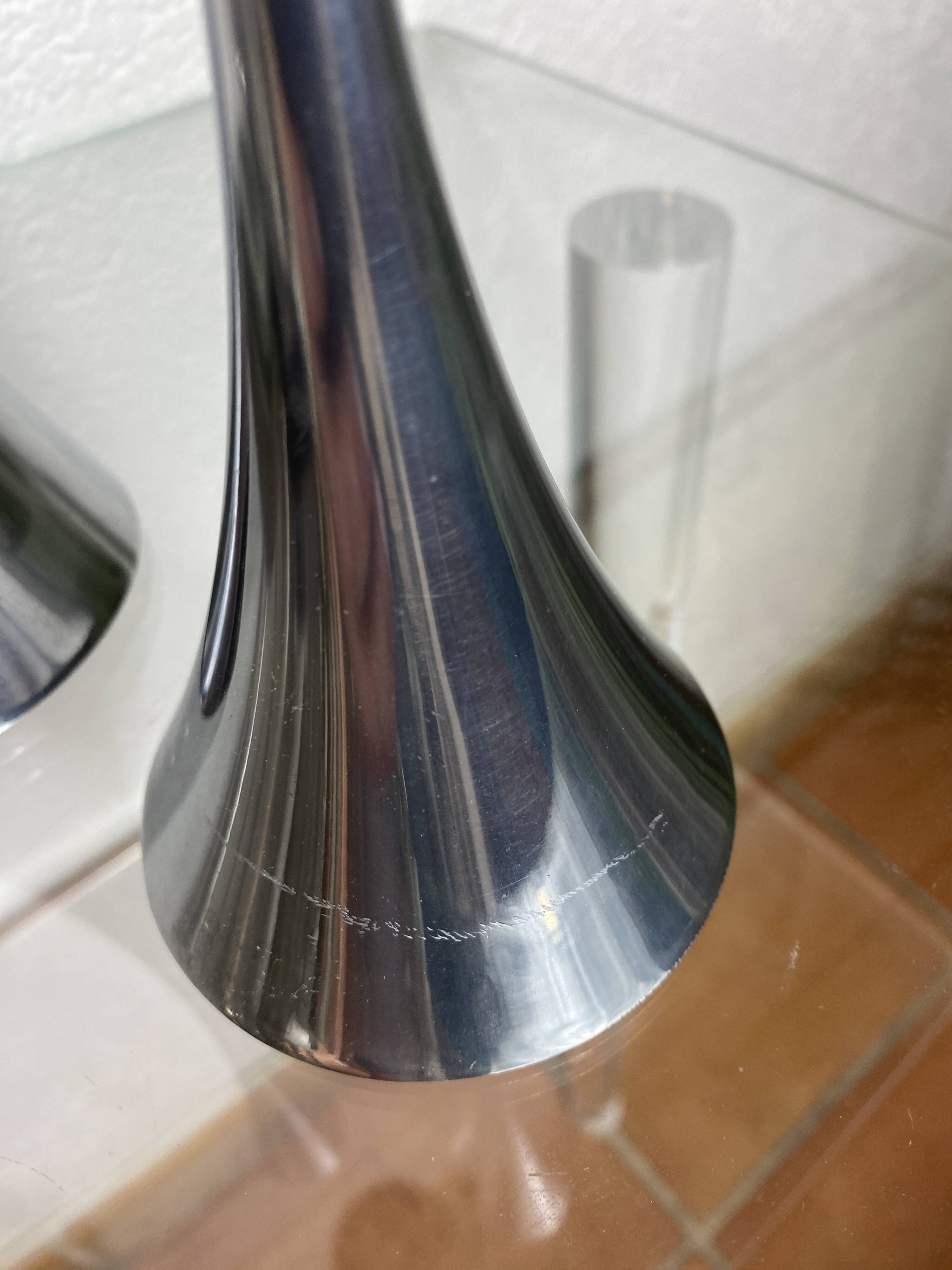 Pair of designer candle holders in stainless steel