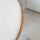 Pouf en rotin et tissu bouclette