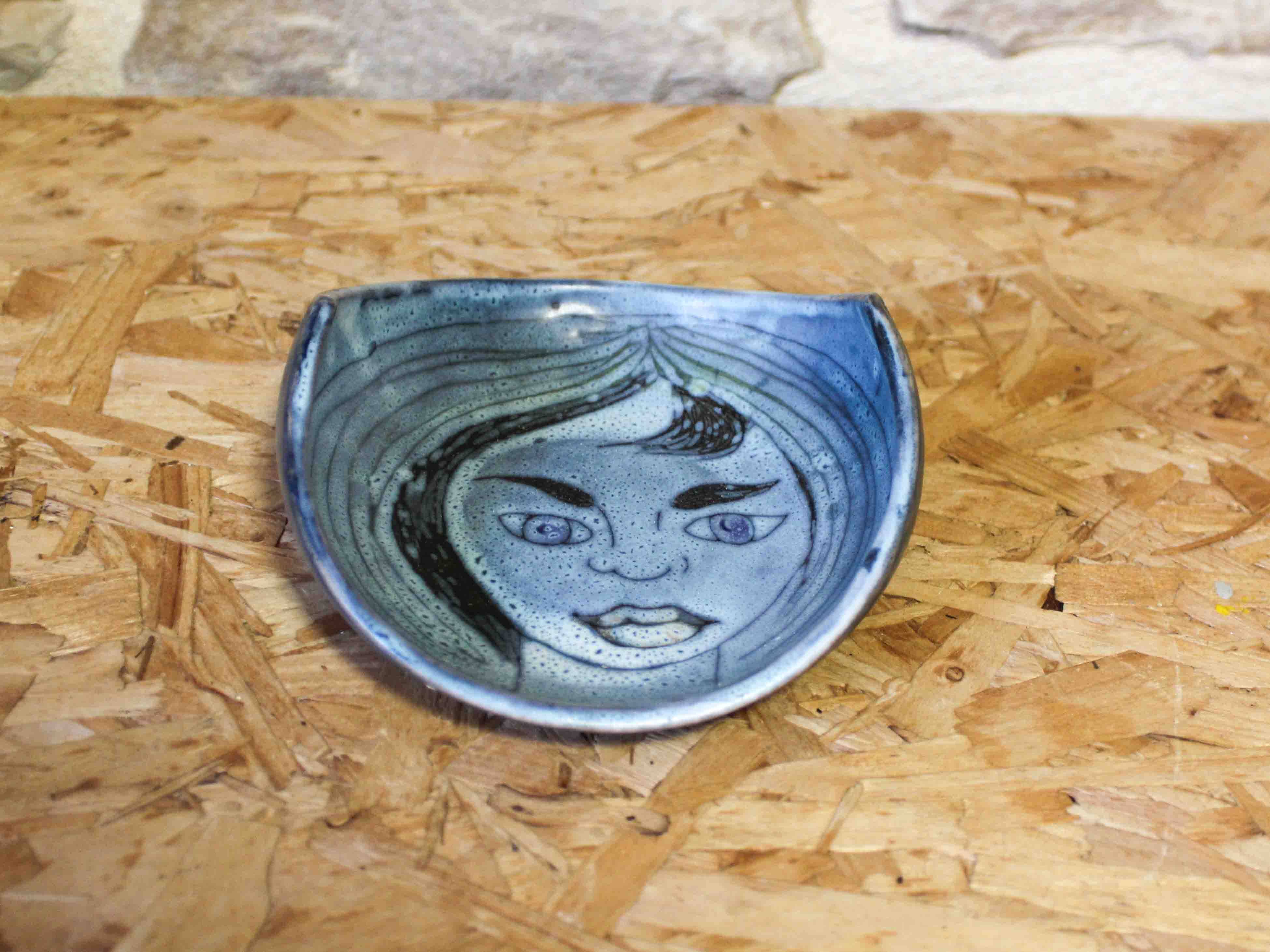 Ceramic catchall with face design