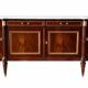 Louis XVI style sideboard in flame mahogany veneer.
