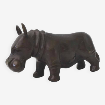 Rhinoceros paperweight in varnished brass