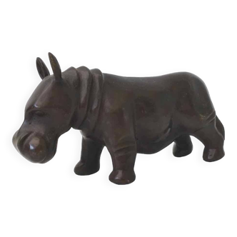 Rhinoceros paperweight in varnished brass