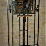 Wrought iron wardrobe with oval mirror