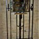 Wrought iron wardrobe with oval mirror