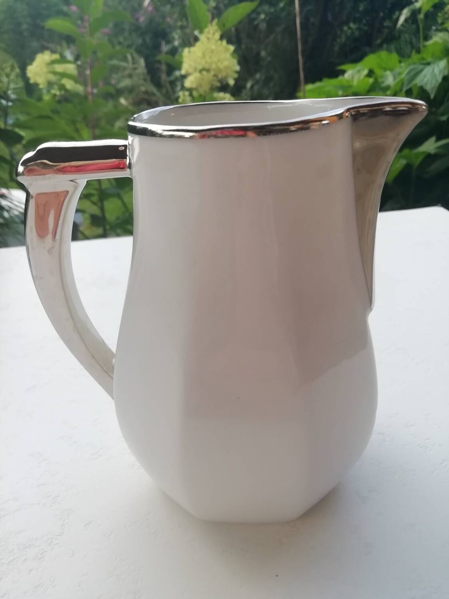 Pair of milk jug teapots
