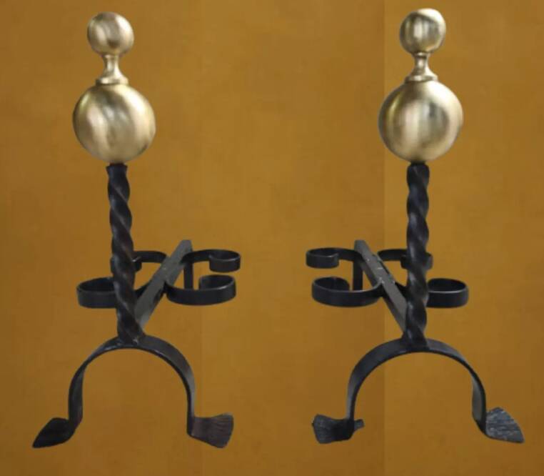 Pair of wrought iron candlesticks with cast bronze ball, 1970s.