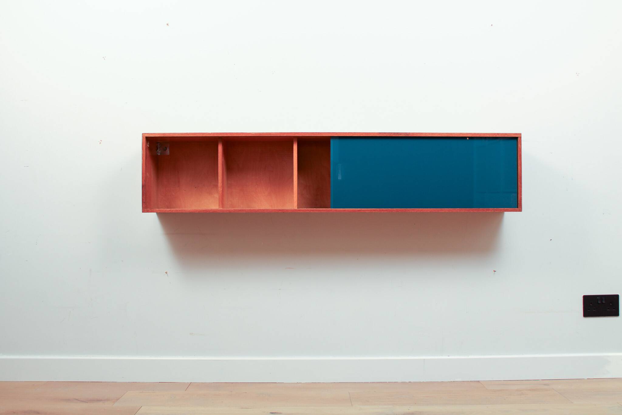 Vintage mid-century wall hung oak cabinets, blue & white sliding glass door