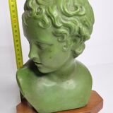 Bust of Eros in patinated plaster in imitation of bronze on wooden base