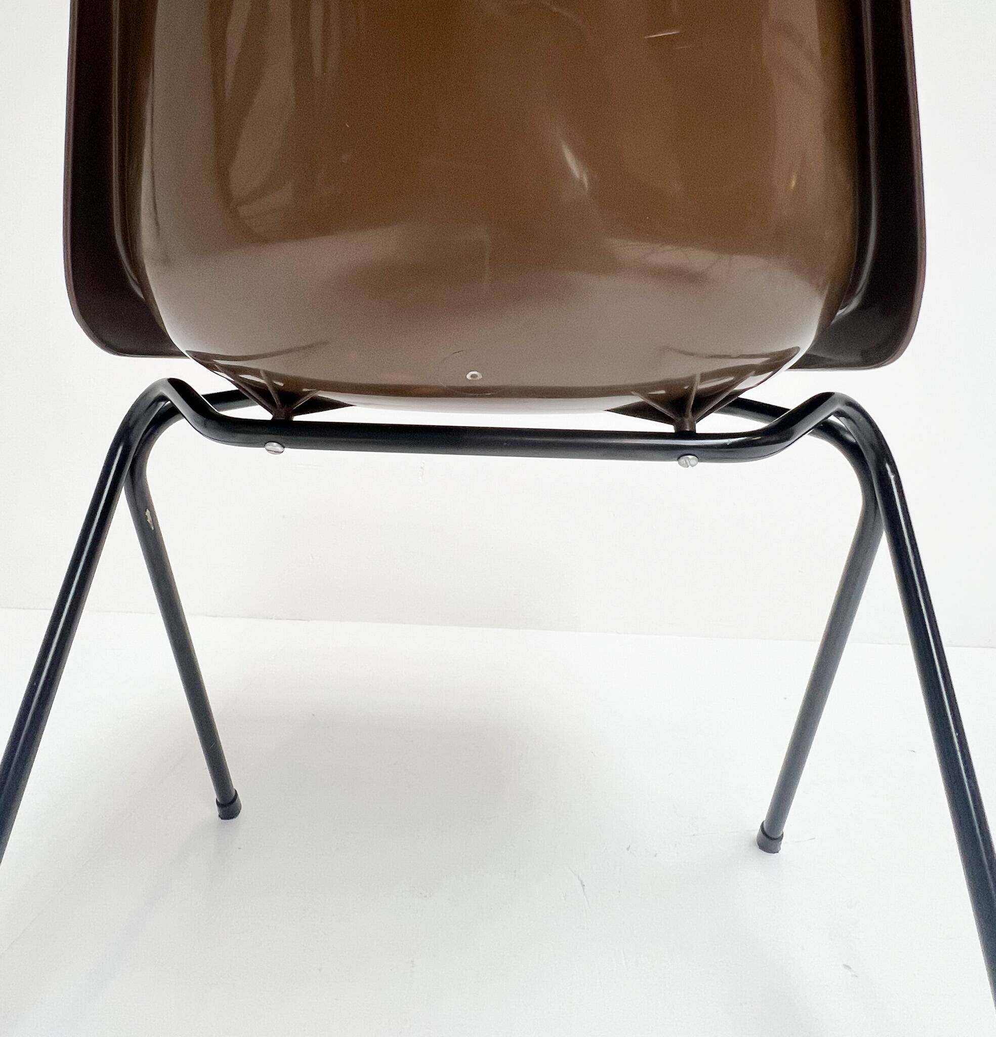 Brown and black set of 6 Polyprop chairs on a metal frame. The Polyprop cha