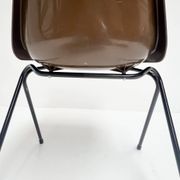 Brown and black set of 6 Polyprop chairs on a metal frame. The Polyprop cha