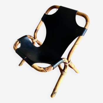 Fauteuil en bambou et cuir en bandoulière