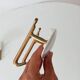Set of 2 wall coat hooks in Bakelite and brass from the 1950s/60s.