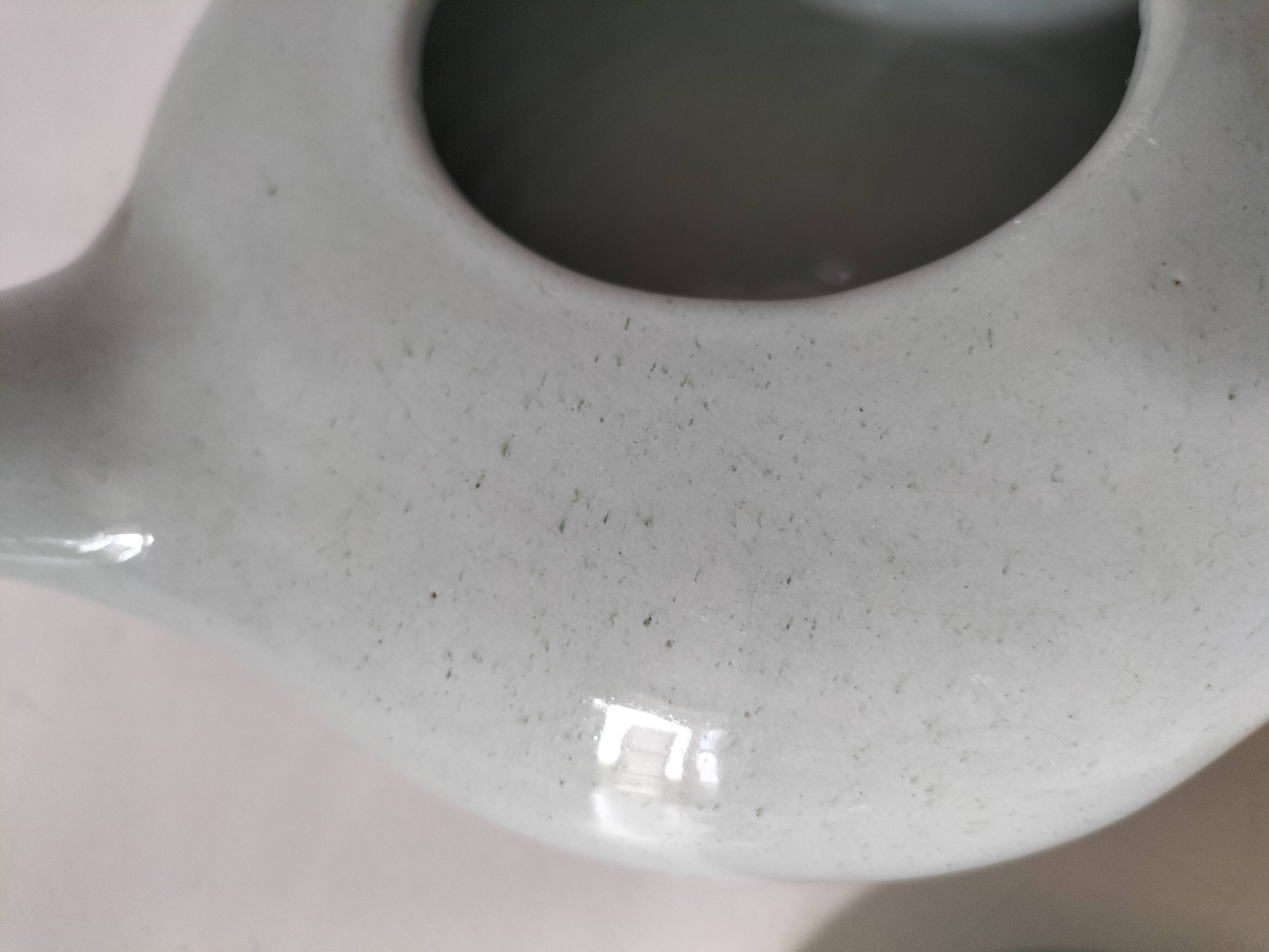 Celadon speckled glazed ceramic teapot