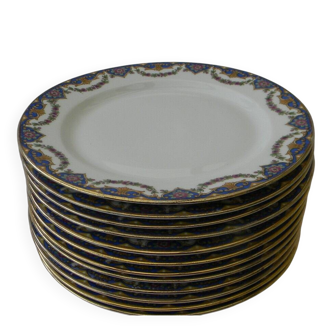 Lot de 12 assiettes à dessert en porcelaine de limoges.