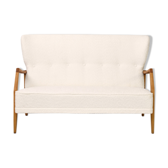 Vintage Scandinavian sofa with faux lambskin