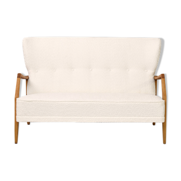 Vintage Scandinavian sofa with faux lambskin