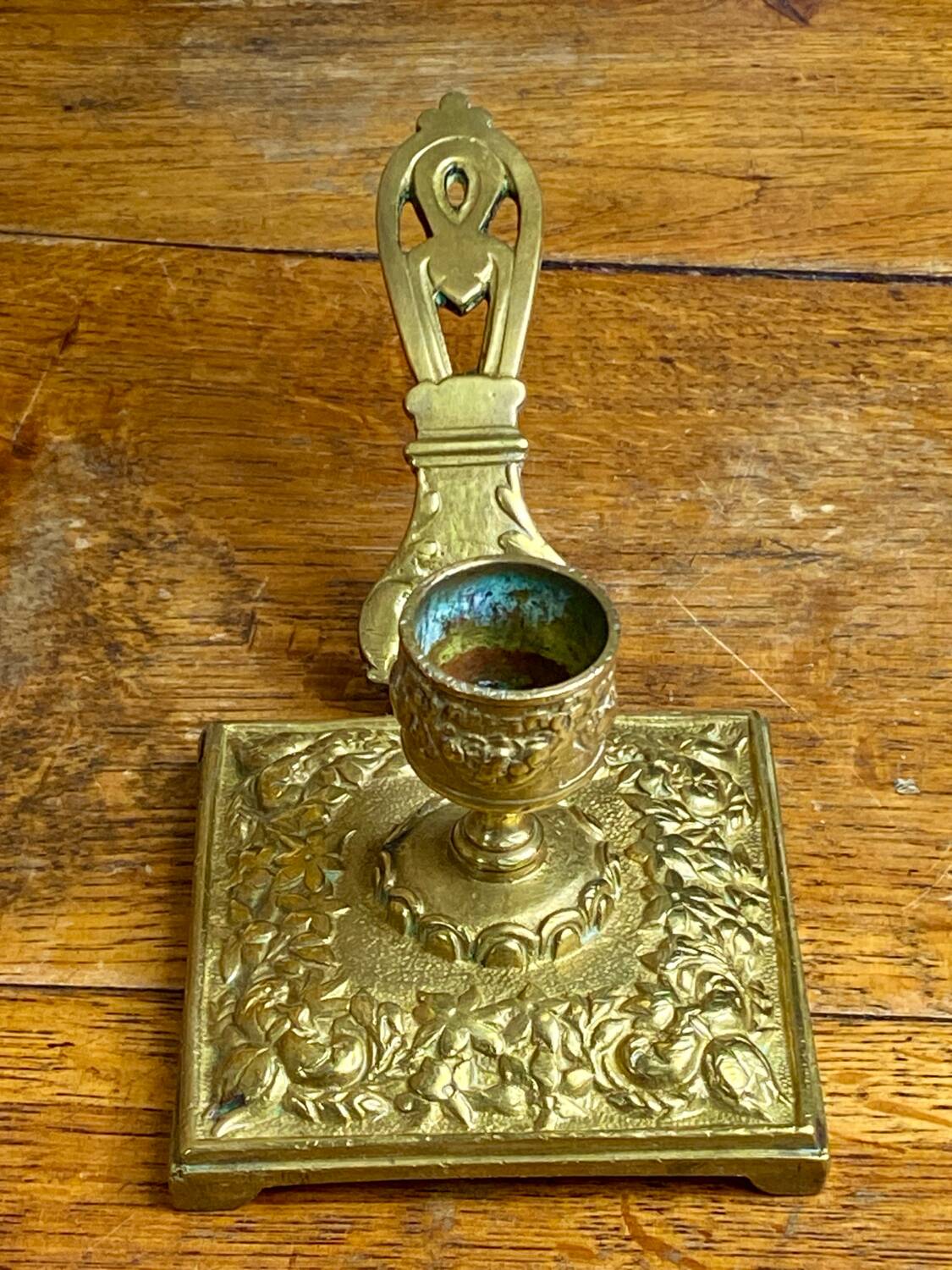 Bronze hand candlestick