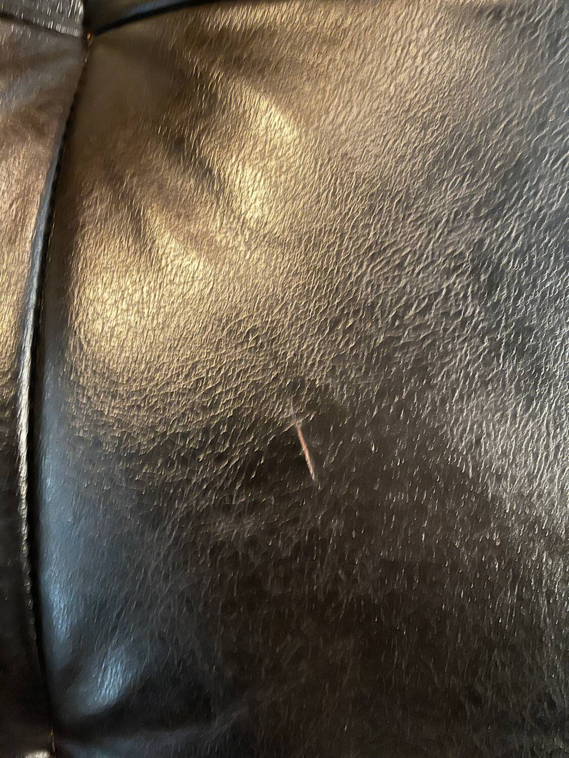 Leather poufs from Roche Bobois around 2000.