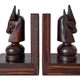 Pair of vintage wooden bookends with stylised horse heads.