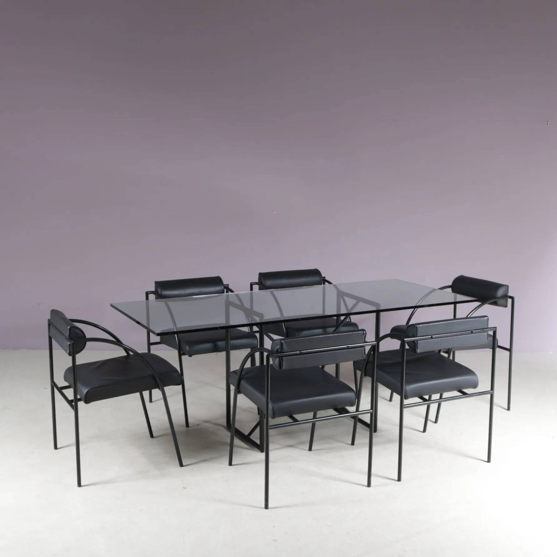 1980s “Tokio” dining table with six “Vienna” chairs by Rodney Kinsman for Bieffeplast, Italy