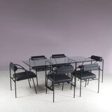 1980s “Tokio” dining table with six “Vienna” chairs by Rodney Kinsman for Bieffeplast, Italy
