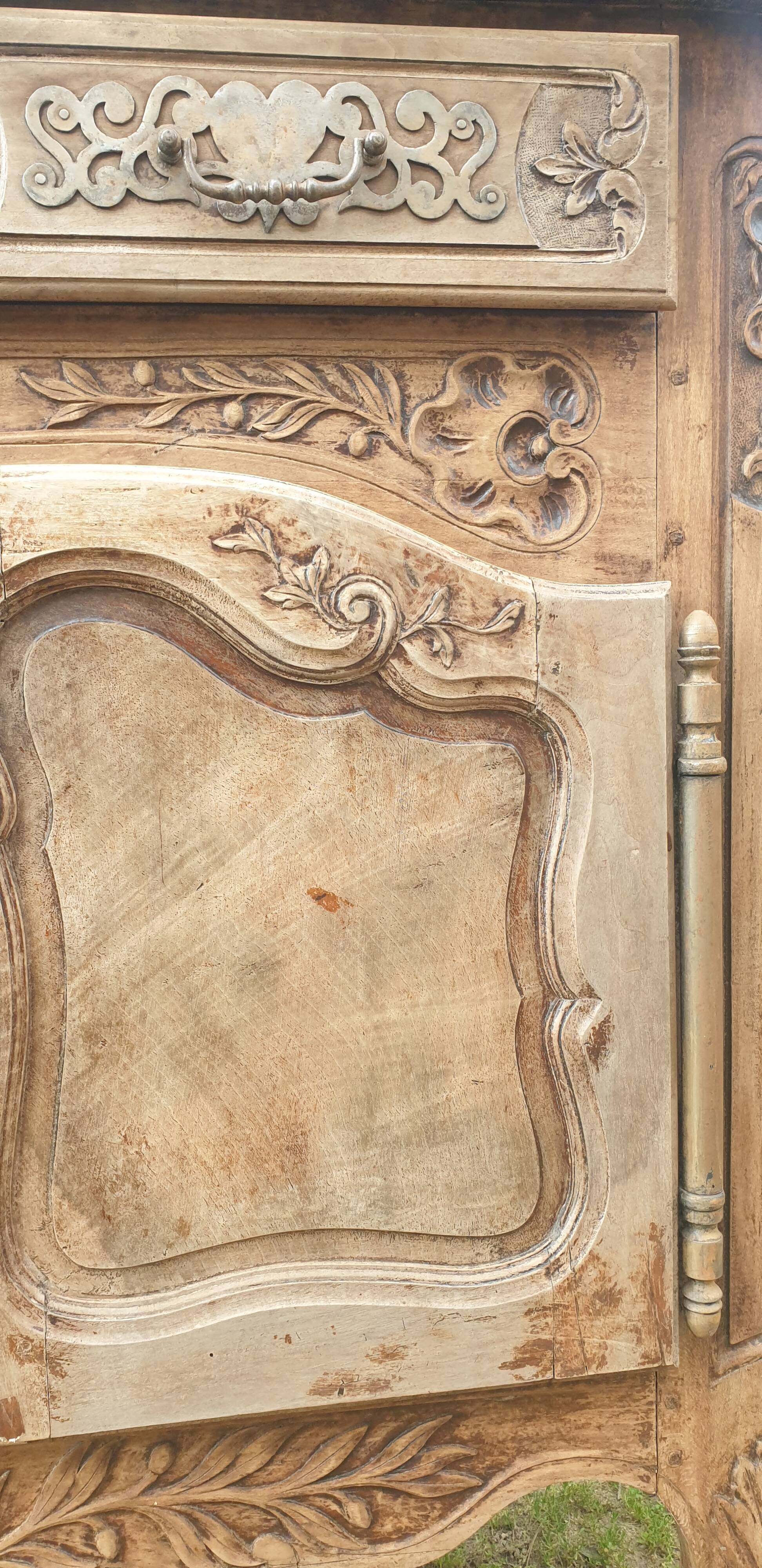 Provencal furniture in finely carved light walnut with wrought ironwork