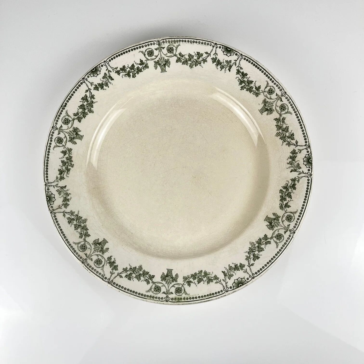 Plat rond "Champagne", Badonviller, vert, début XXème s.