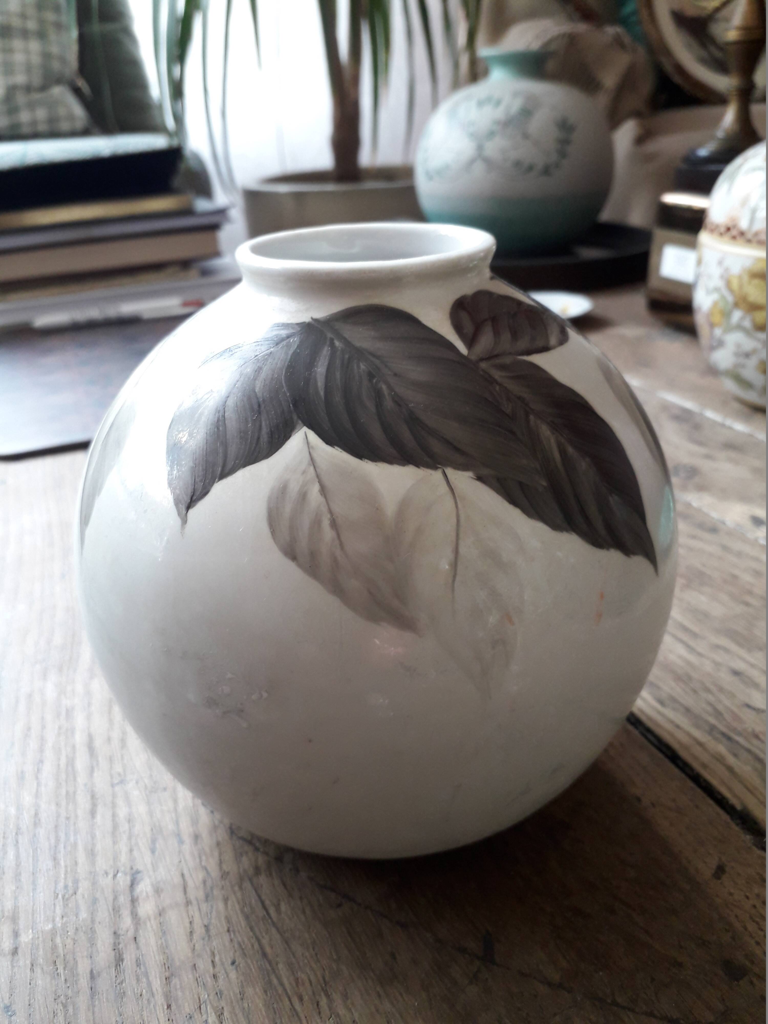 Vintage vase with plant decoration signed