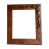 Wooden frame with plating and applied bay leaves