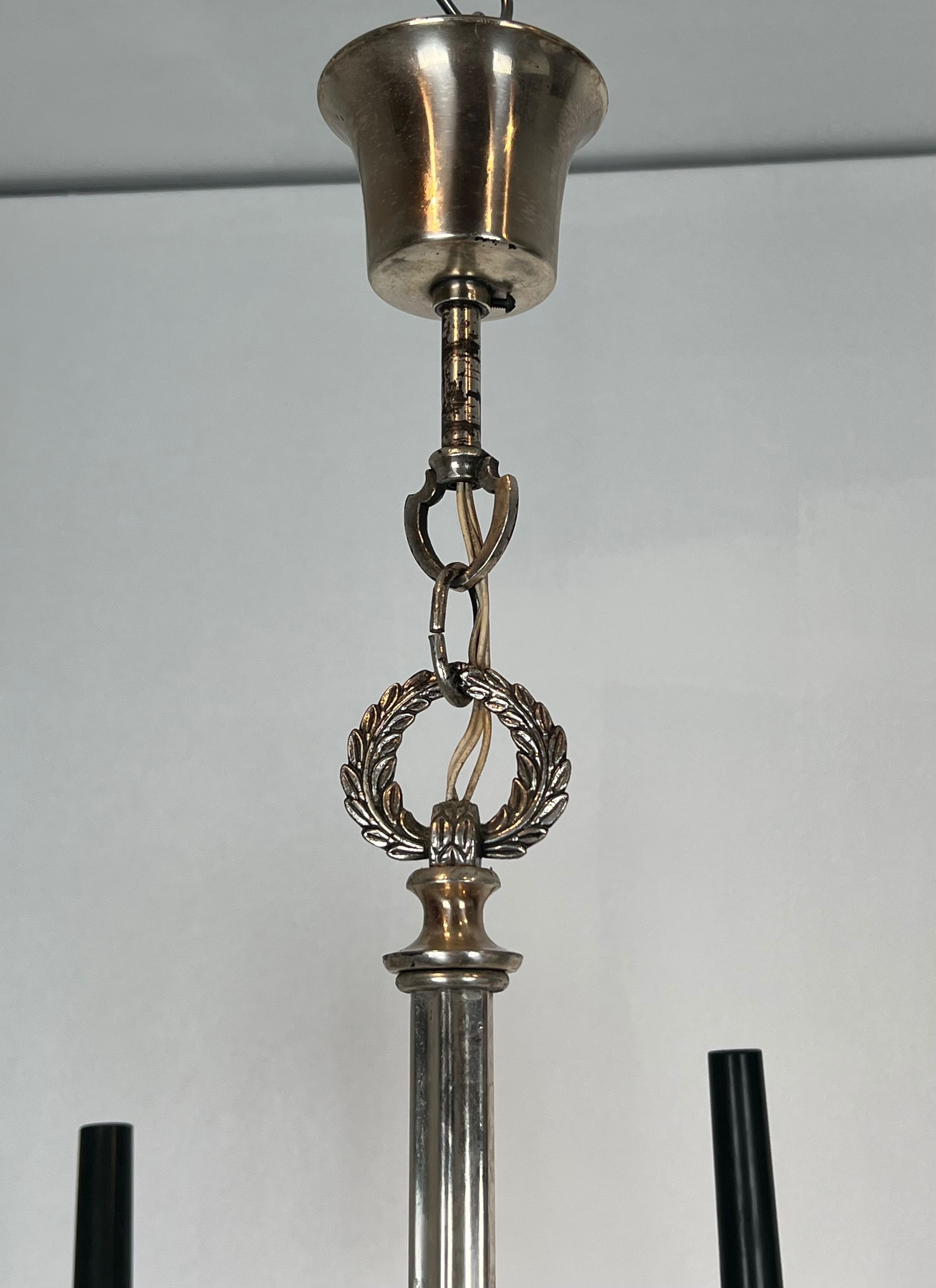 Neoclassical style chandelier in silver-plated metal by the house of Charles.